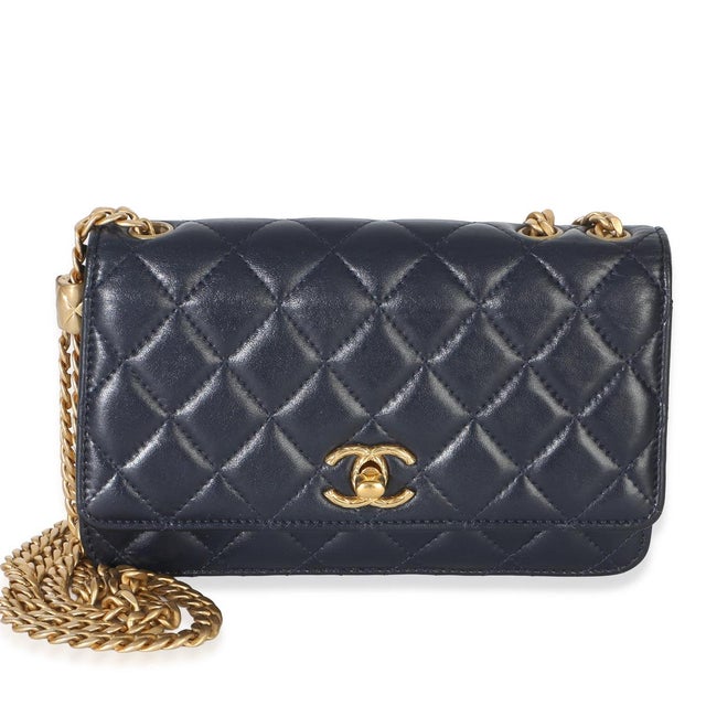 Item #: 154791 Interior Material: Fabric;Leather Dimensions: 7.5 x 5 x 1.5 in Features Interior: Two slip pockets. One zip...