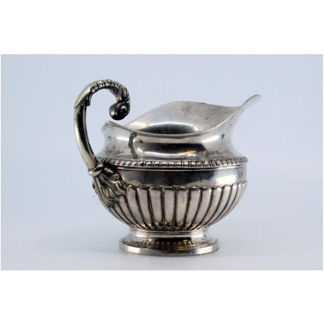 Creamer in Fluted Silver, in Very Good conditions. Designed before 1890 This piece has an attribution mark, I am sure that...