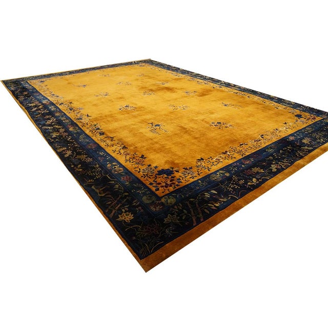 Antique Large Wool - Manchester Blue Yellow Hand Knotted Pile Rug, Circa Date: 1920s. This exceptional piece captures the...