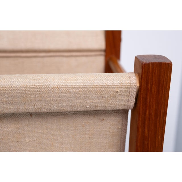 A classic mid century, 2 bin, teak, magazine holder. Light and sturdy with minimal wear throughout. This unique piece is...