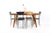 Arper made chairs that understood the assignment: get out of the way and let the leather do the talking. Slender black...