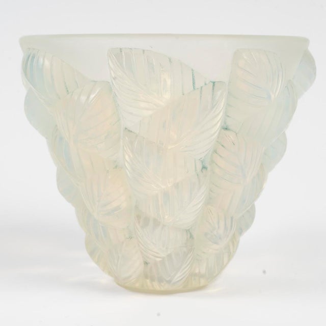 "Moissac" vase in opalescent glass. Model created on [March 8, 1927], not produced after 1947. Engraved signature. Height:...