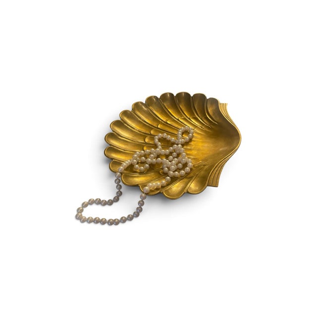 Heavy mid century brass catchall. Perfect for jewelry or keys.