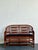 This captivating vintage rattan settee draws inspiration from the exotic architectural romance of the Brighton Pavilion,...