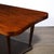 A rare and striking Art Deco "Paldao Series" dining table designed by Gilbert Rohde for Herman Miller, featuring walnut...