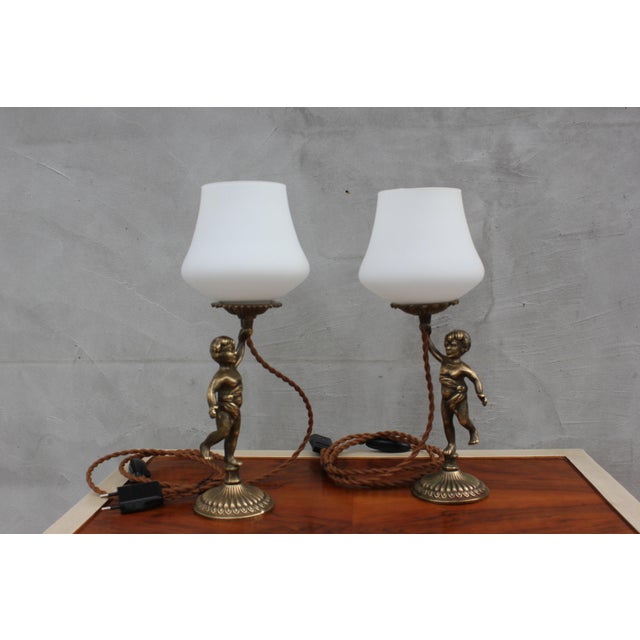 Vintage Brass Cherub Bedside Lamps Pair Baroque Table Lamps with White Glass Shades Antique brass cherub statues converted...