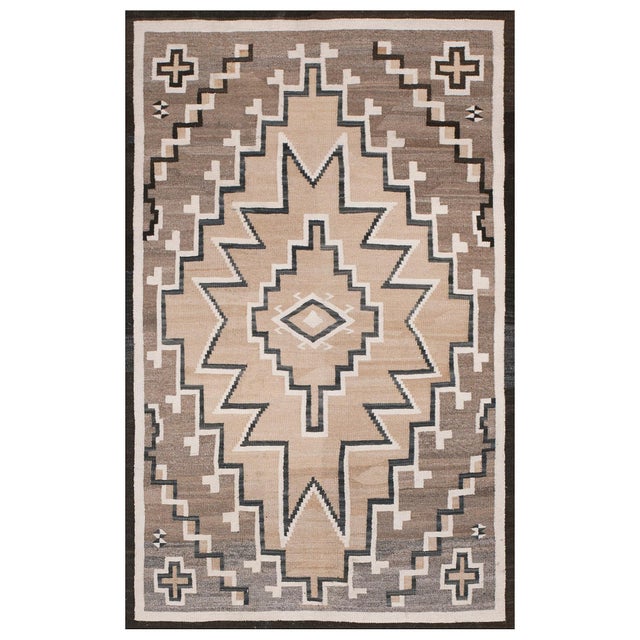 Antique Navajo American Flat Weave Rug refined, Circa Date: 1930s. This exceptional example of Southwestern textile art...