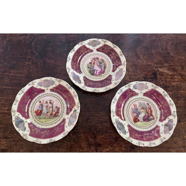 Enhance your wall display or currier cabinet with this exquisite set of three antique/vintage European porcelain cabinet...