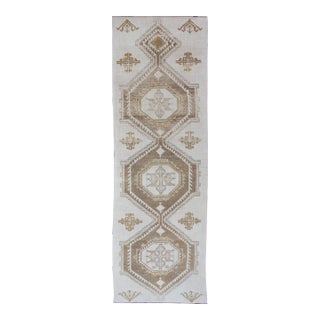 Subdued Vintage Hand Knotted Turkish Oushak Runner With Medallions in Cream and Brown For Sale