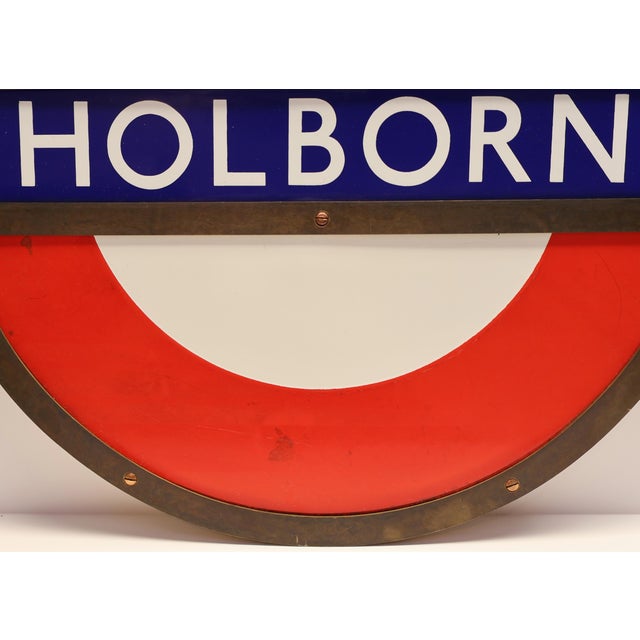 A vintage original London Underground enamel sign, once displayed at the iconic Holborn Station. Since its first...