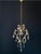 A beautiful antique chandelier in the louis xv style. italy, 20th century. the chandelier is made of brass—beautifully...