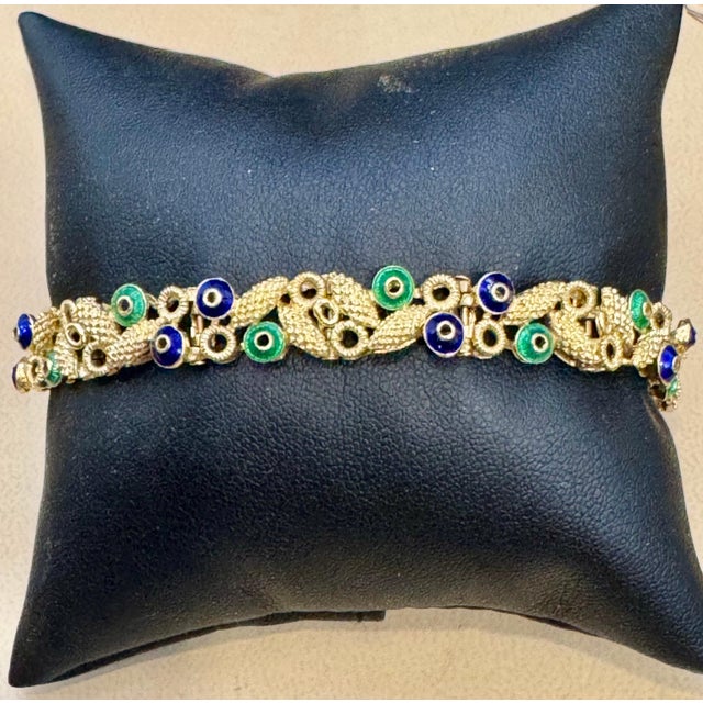 18 Karat Yellow Gold 30 Grams With Green and Blue Enamel Bracelet, 8 Inch Long 18 Karat Gold 30 Grams Width of bracelet is...