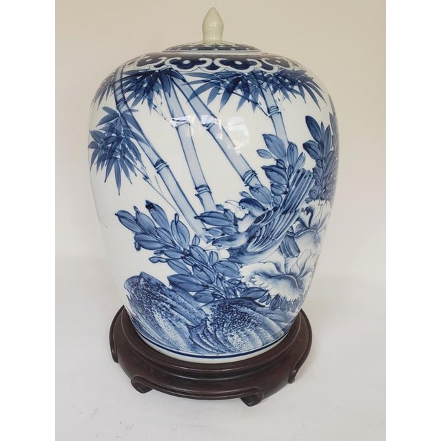 Chinoiserie Vintage Chinese Blue & White Porcelain Ginger Jar With Birds & Bamboo, Wood Stand For Sale - Image 3 of 10