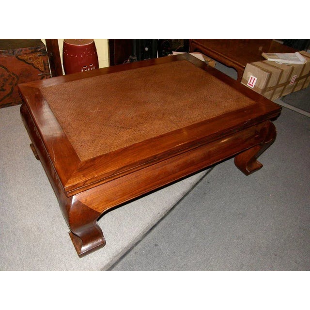 Chinese 19th century chow leg elmwood coffee table with woven bamboo top.