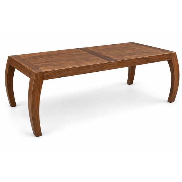 A striking large-scale dining table that blends clean contemporary lines with the warmth and character of beautifully...