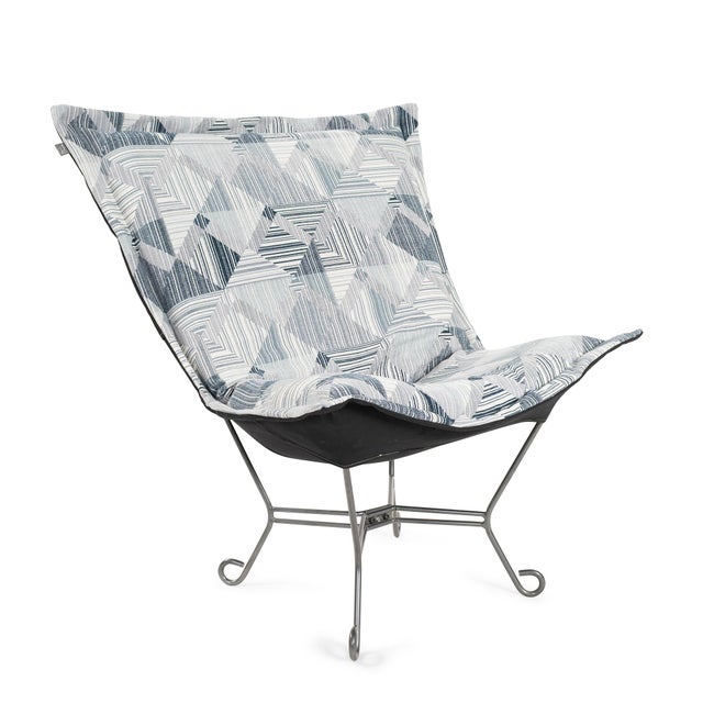 Add a touch of modern edge with this dynamic geometric jacquard fabric in cool tones of navy, steel, and silver. Intricate...