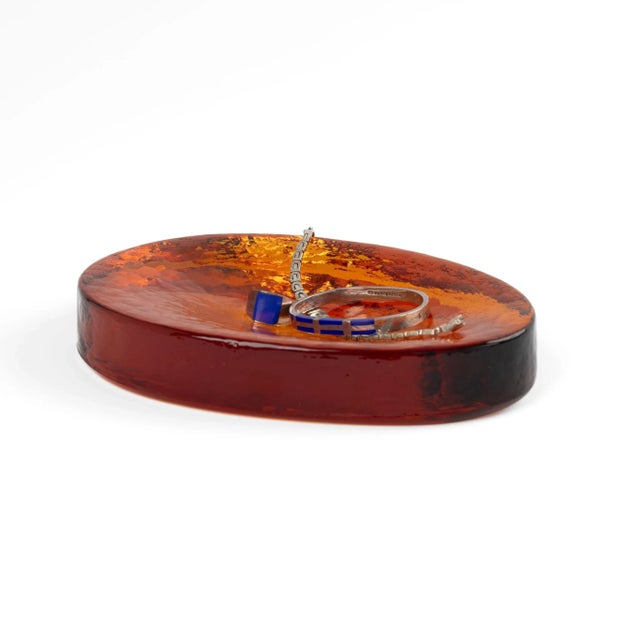 Sculptural amber Murano glass catchall in an organic freeform shape, crafted by renowned Italian glassmaker Vincenzo Nason...