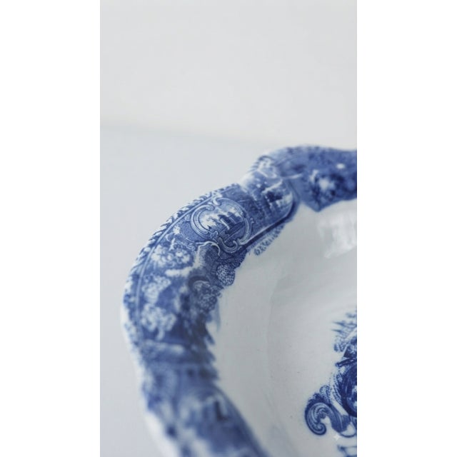 A striking two-piece vintage Victoria Ware Ironstone wash set featuring a large decorative ewer and coordinating...