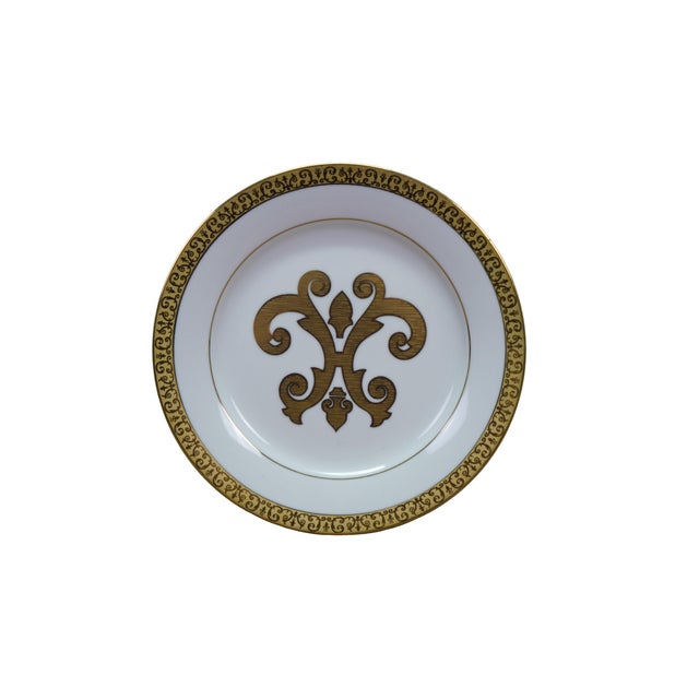 Produced in 1991 exclusively for Macy's, these premium buffet plates feature a striking, classical aesthetic. Each crisp...