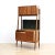 This mid-century vinyl record media cabinet was custom made in England during the 1960s. Typical of the period, it was...