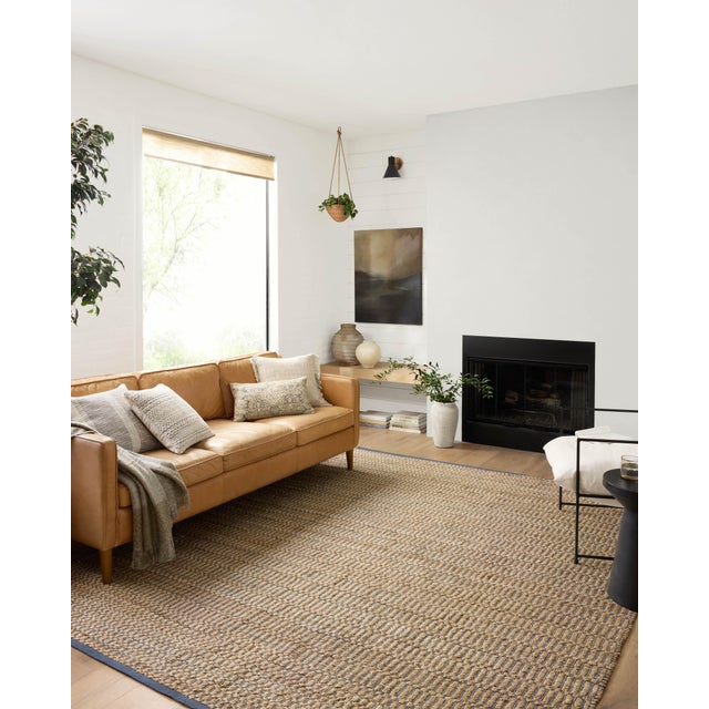 The Colton Collection by Angela Rose x Loloi is a new take on the staple jute rug, blended with cotton for added softness....