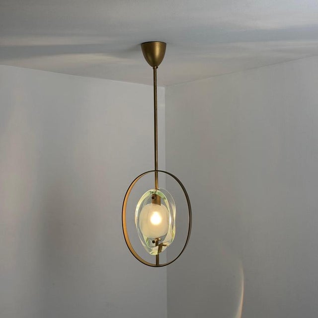 An exceptionally rare and completely original Model 1933 pendant light, designed by Max Ingrand for Fontana Arte and...