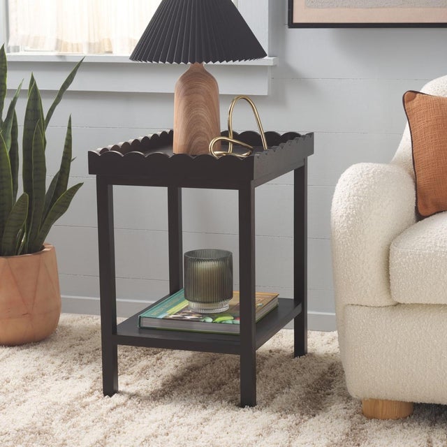 Brighten your living space with the Starlyn Accent Table in a soothing matt black color. Its sleek design make it a...