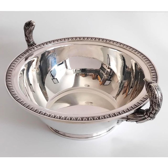 This elegant Empire-style centerpiece bowl is crafted in France of high-quality silver plate over a solid metal blanc base...