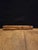 This is a dvojnice (also known as a twin or double-barrel flute), a traditional hand-carved wooden folk instrument...