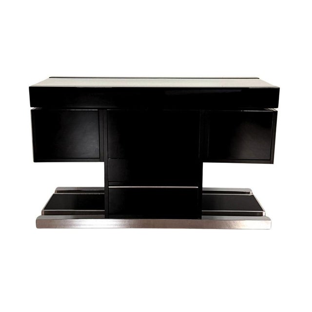 Vintage italian modern dry bar and room divider in black lacquer and chrome by manufacturer mario sabot, circa 1970s....