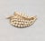 1960s goldtone faux-pearls and small round clear rhinestone accents in the shape of a leaf brooch with security clasp....