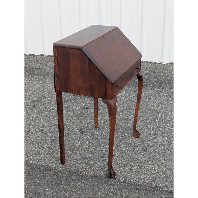 This stunning early 20th-century French Louis XVI-style secretary desk—often referred to as a "petite" desk—is a true...