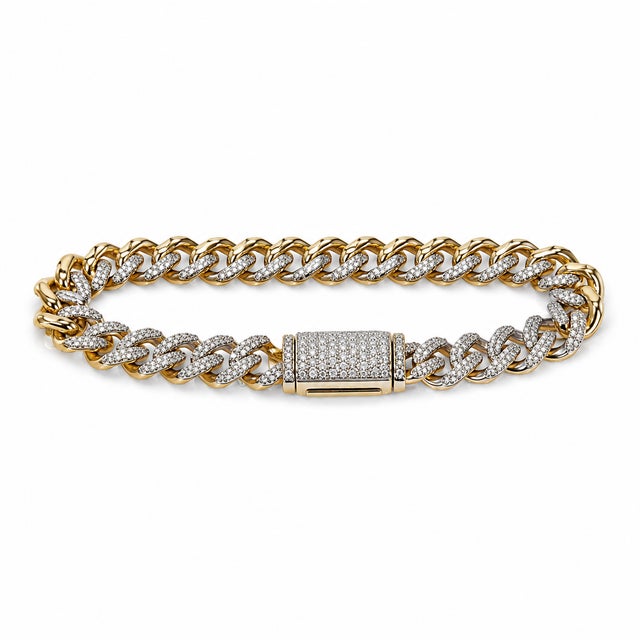 Bold and substantial, this 10K Yellow Gold -link bracelet is accented with round natural diamonds for a richly detailed...