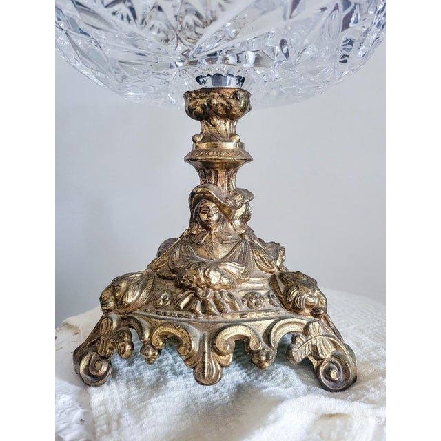 Make an unforgettable statement with this elegant vintage cut crystal compote displayed on an exquisitely detailed gilt...