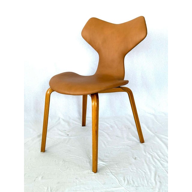 Unmarked Arne Jacobsen Leather "Grand Prix" chair, model 4130. Designed in 1957. Produced by Fritz Hansen. Last Photo is...