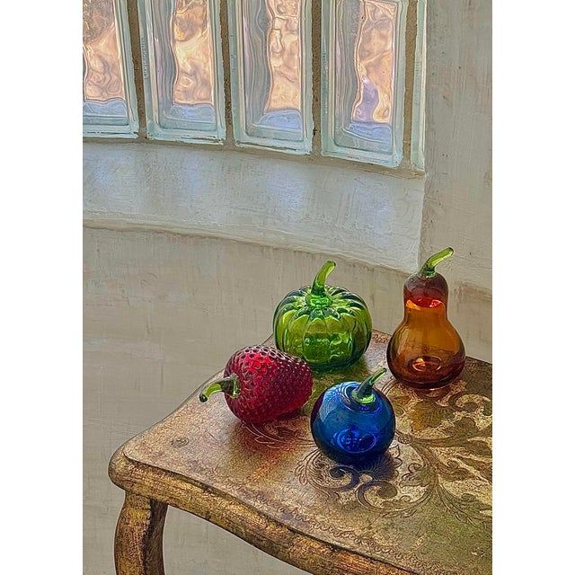 Colorful set of four vintage 1970’s hand blown glass fruit by the Rainbow Art Company, founded in 1940 and located in...