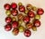A gorgeous set of 25 Deep Red and Gold Christmas Tree Ornaments. The set includes both glass and shatterproof globe-shaped...