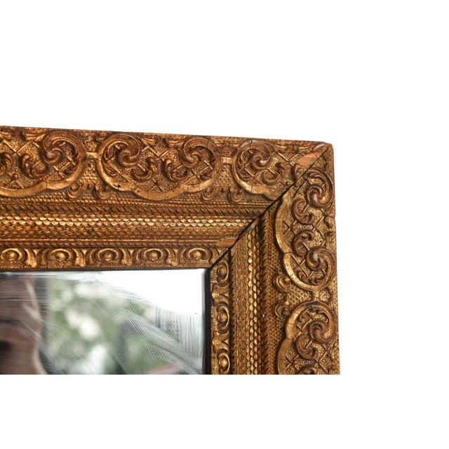 Enhance your home with the 19th Century Antique Louis XVI Gilt Wooden Ornate Gesso Wall Mirror. This exquisite piece...
