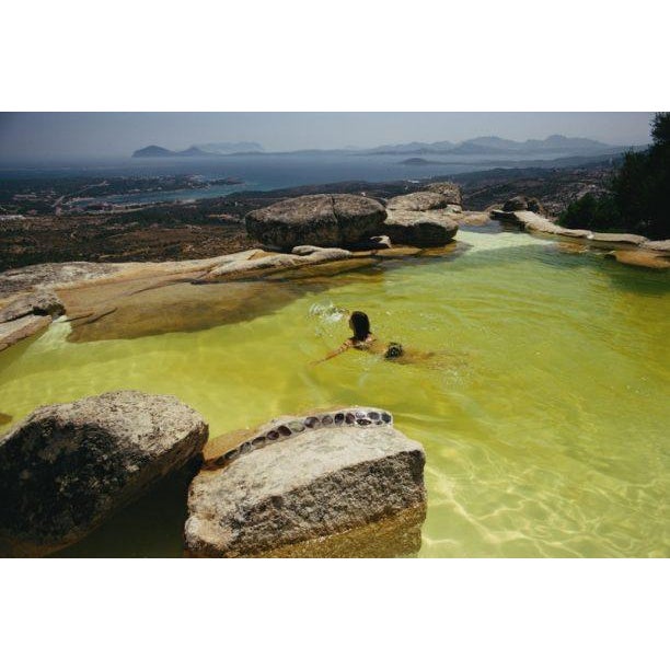 Monte Mano 1973 A swimmer in the seaside-style pool at architect Jacques Coulle’s home ‘Monte Mano’, on the Costa...