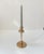 A heavy candlestick holder executed in solid bronze. For a regular sized candle. Signed/marked Oskar Olsson, 1935. Made in...