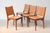 Set of twelve organic shaped dining chairs in teak designed by the Danish designer Johannes Andersen for Uldum Møbelfabrik...