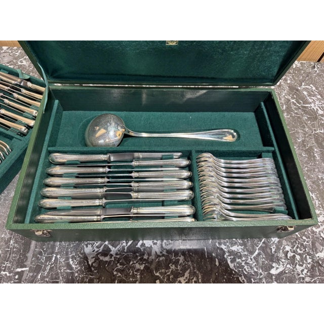 A 73-piece Christofle flatware set, "Spatours" pattern, in silver-plated metal, dating from the 1950s. The set comprises...