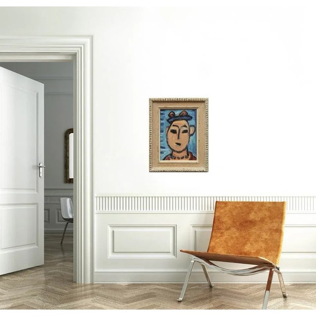 Portrait of a woman in the manner of artist George Rouault (French 1871-1958). Oil on canvas handsomely framed in a white...