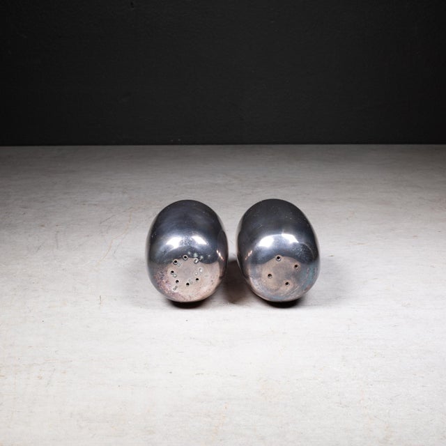 ABOUT A set of patinated silver plated salt and pepper shakers. Embossed "Dansk Design Japan". CREATOR Dansk Design Japan....
