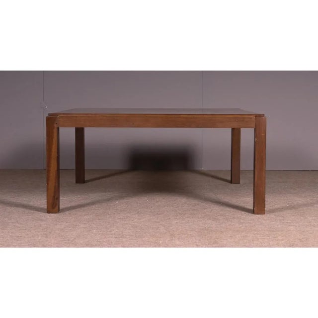 Artemide rectangular coffee table, ash wood top and red lacquered feet. Measures Height 31 cm Width 130 cm Depth 80 cm