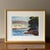 Watercolor painting depicting an old military barracks along a river. Signed by artist. Vintage gold frame. Newly framed...