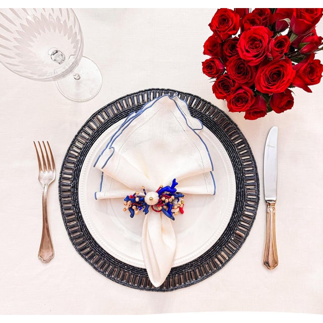 Add a touch of elegance and sophistication to your table with our Linen Napkins with Blue Ruffled Hemstitch Edges, a set...
