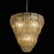 This majestic ceiling lamp is an ode to Murano's artisanal luxury. It comprises five staggered tiers supporting delicate,...