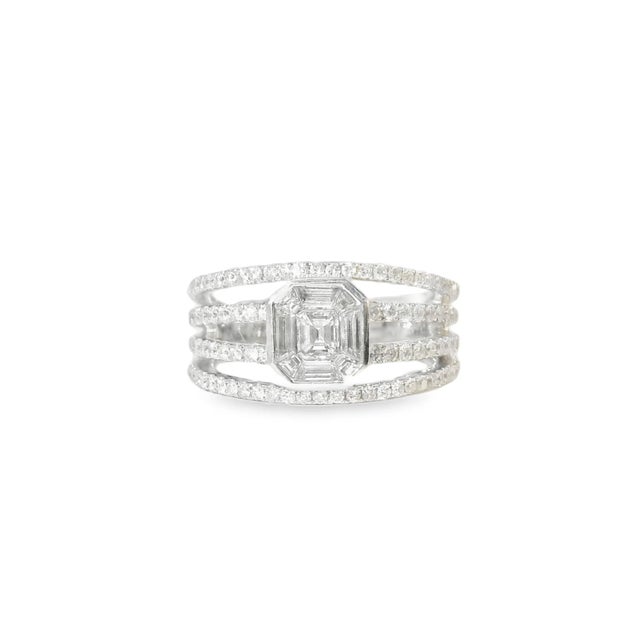 Gorgeous Estate 14K White Gold Engagement Diamond Ring. Metal: 14K White Gold Gemstones: Brilliant Round and Baguette...