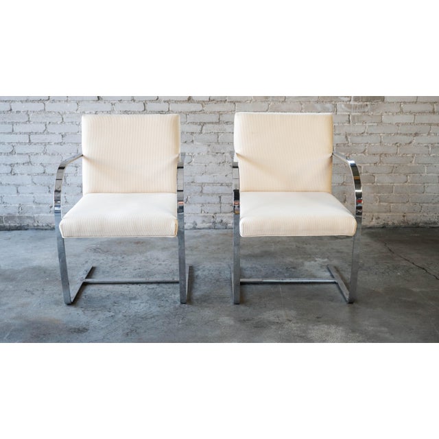 Vintage Brno Flat Bar style armchairs attributed to Mies van der Rohe for Knoll, a pair. Vibrant flat bar chrome frame and...